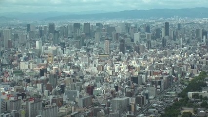 OSAKA, JAPAN - CIRCA SEPTEMBER 2019 : Aerial high angle view of CITYSCAPE of OSAKA in daytime. Osaka is the capital city of Osaka Prefecture and the second largest metropolitan area in Japan.