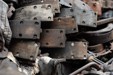 Old engine parts, steel and used car parts, for engineering. Selective focus.