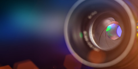 Camera lens with lense reflections, macro shot, close-up.