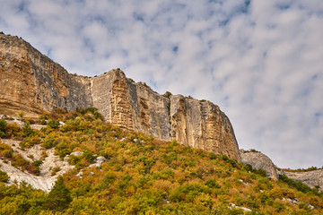 Fototapeta na wymiar Cliff in autumn with beautiful sky