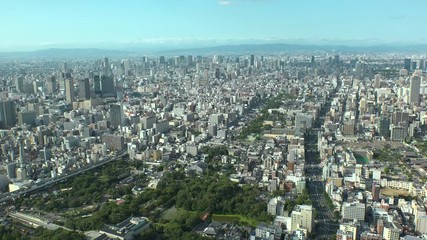 OSAKA, JAPAN - CIRCA SEPTEMBER 2019 : Aerial high angle view of CITYSCAPE of OSAKA in daytime. Osaka is the capital city of Osaka Prefecture and the second largest metropolitan area in Japan.