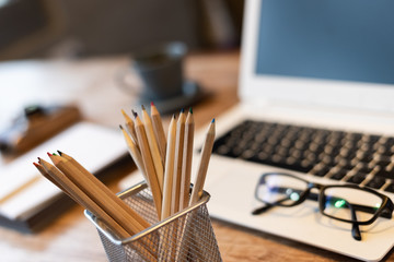 pencils and laptop