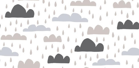 Hand drawn vector seamless pattern illustration of a raining cloud. Scandinavian style flat design for kids. The concept for children's textile, wrapping, wallpaper, covers.