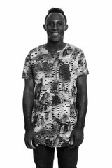 Studio shot of young African man in black and white