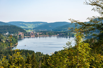Fototapeta na wymiar Black Forest in Bavaria, Germany. Lake Titisee, surrounded by unspoilt nature among mountains, forests and enchanting countries.