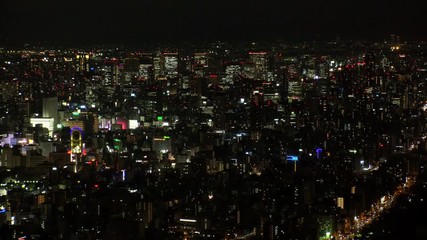OSAKA, JAPAN - CIRCA SEPTEMBER 2019 : Aerial high angle view of CITYSCAPE of OSAKA in night time. Osaka is the second largest metropolitan area in Japan.
