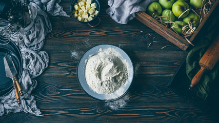 Apple pie making process, flour in the plate