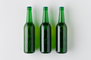 Top view of three beer bottles mockup.
