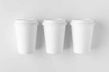 Top view of a 12 oz. white coffee paper cup mockup with lid.