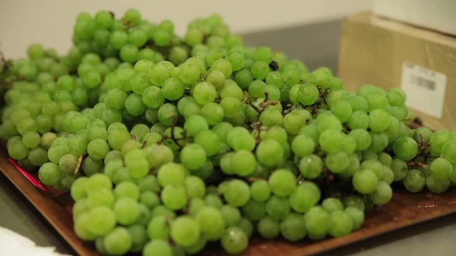 Healthy snacks. Close up of green grapes