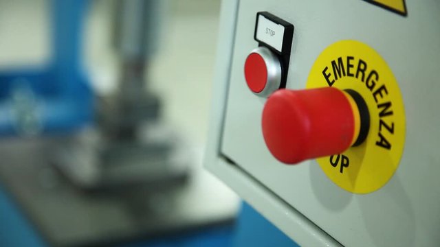 Emergency red button. Industrial setup