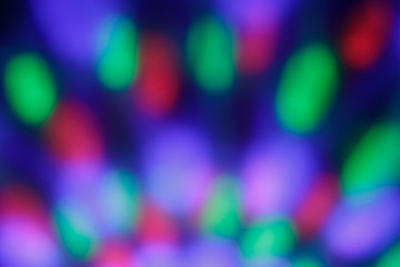 Colorful lights, backgrounds. Abstract festive blurred bokeh. Defocused backdrop with night light. Illuminated blur pattern.
