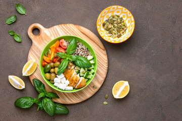 Greek inspired buddha bowl with grilled chiken breast