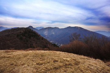 a little lake in italy, near the mountain