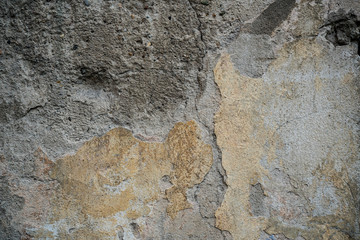 Texture of an old wall covered with paint. Background image of a worn paint coated surface