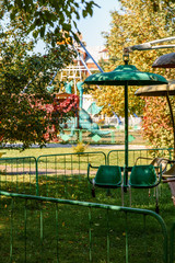 children's attraction carousel without people in the autumn Park