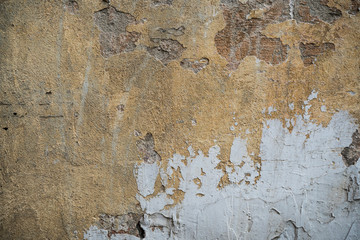 Texture of an old wall covered with paint. Background image of a worn paint coated surface