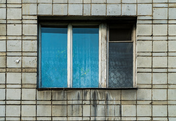 Fototapeta na wymiar Photo of not a new window of battered time