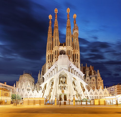 Sagrada Familia, a large Roman Catholic church in Barcelona, Spain, designed by Catalan architect Antoni Gaudi, on February 10, 2016. Barcelona - obrazy, fototapety, plakaty