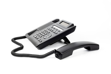 Dark telephone set on a white background