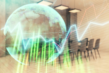 Obraz premium Double exposure of stock market graph with globe hologram on conference room background. Concept of international finance