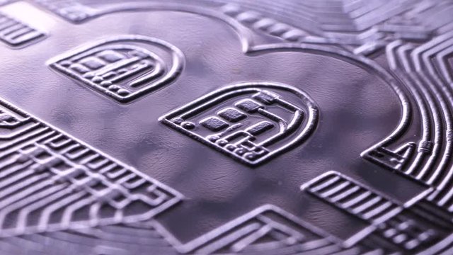 Close up of a crypto currency dash coin 