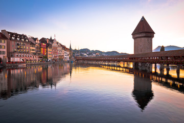 Fototapeta na wymiar Luzern wooden Chapel Bridge and tower dawn view