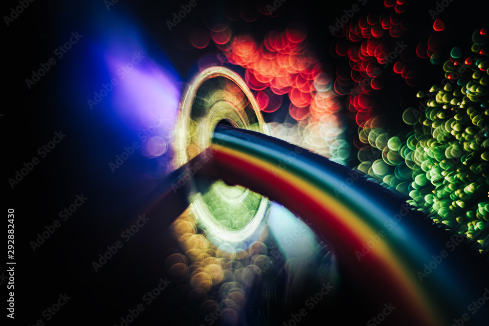 Poster Beautiful abstract rainbow bridge and multi colored space background in the darkness.