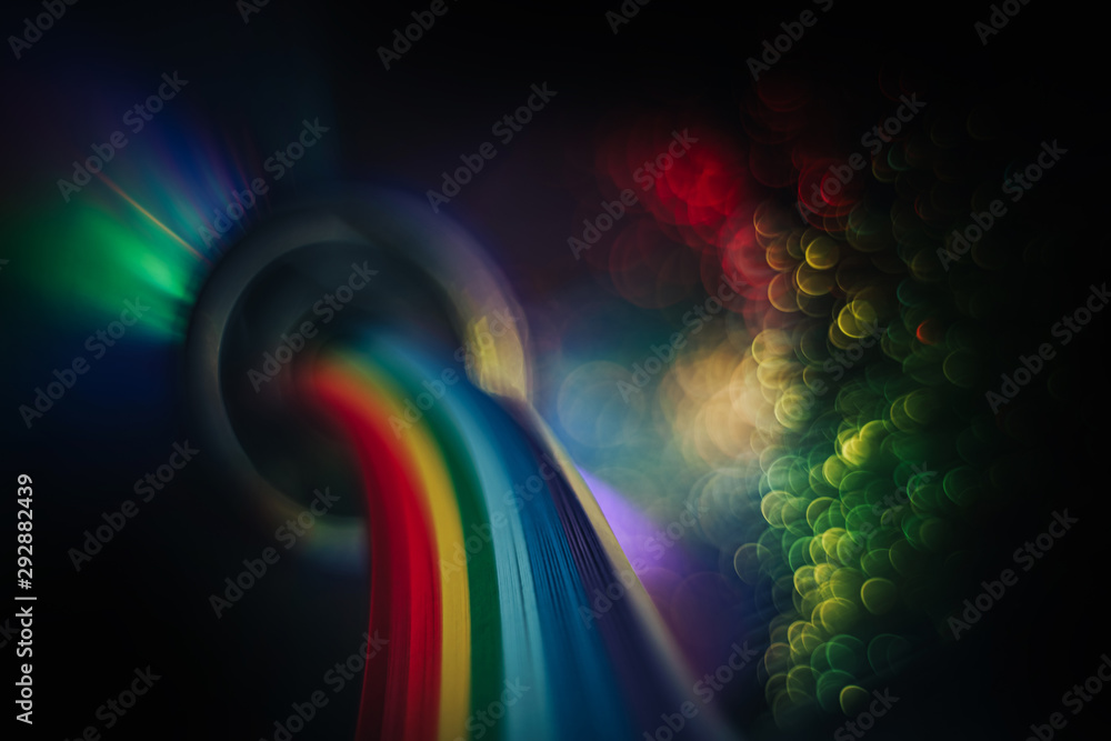 Poster beautiful abstract rainbow bridge and multi colored space background in the darkness.