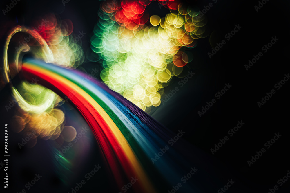 Poster beautiful abstract rainbow bridge and multi colored space background in the darkness.