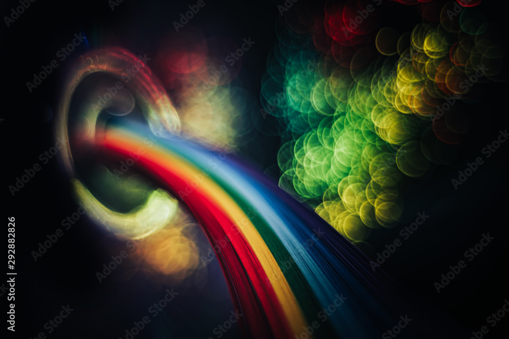 Poster beautiful abstract rainbow bridge and multi colored space background in the darkness.