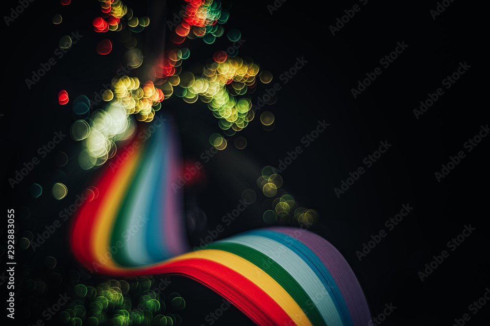 Poster beautiful abstract rainbow bridge and multi colored space background in the darkness.