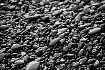 Black Beach Reynisfjara Island schwarze Kiesel Strand Lava Vulkanismus Hintergrund Nass Brandung...