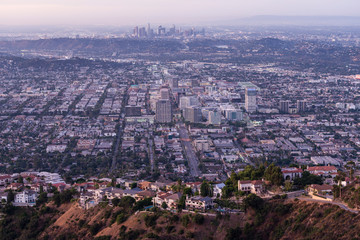 Twilight cityscape view of hilltop homes and downtown Glendale near Los Angeles and Burbank in Southern California.