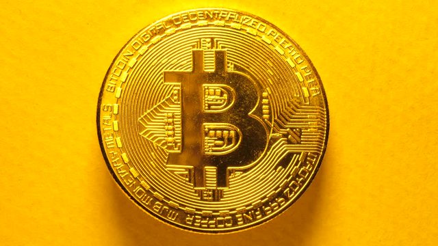 Close up of a crypto currency dash coin 