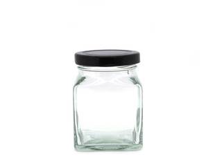  Empty glass food storage jar isolated on white background.