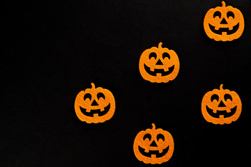 Halloween party. Scary orange pumpkin decoration isolated on bla