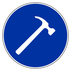Hammer und Verkehrsschild