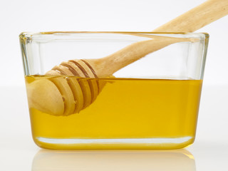 honey and wooden stick