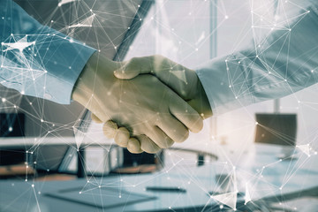 Multi exposure of tech theme hologram on office background with two men handshake. Concept of...