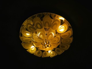 Gold crystal ball on black background