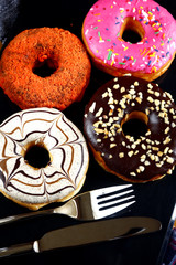 Freshly made assorted sweet donuts