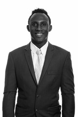 Studio shot of young African man in black and white