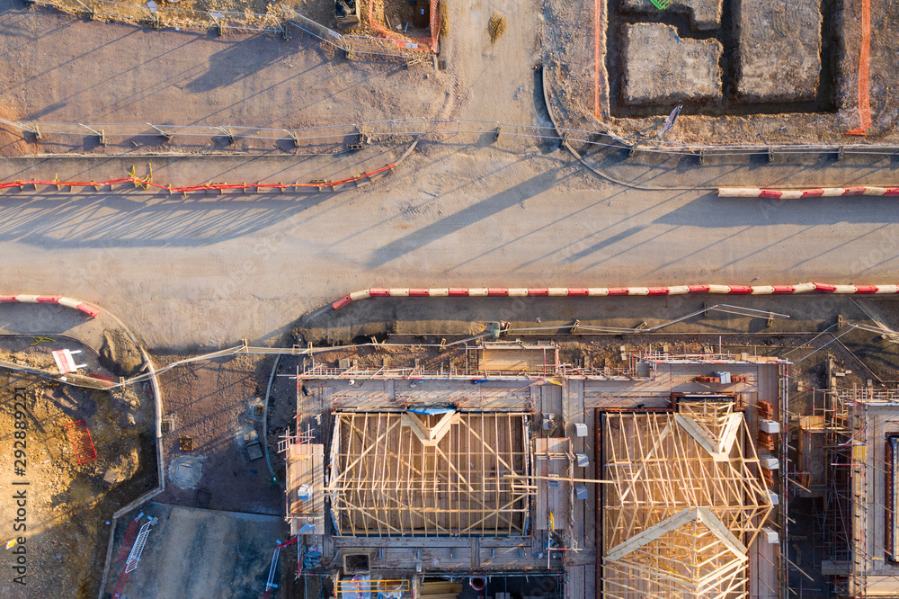 Wall mural aerial view over a construction site of new homes being built