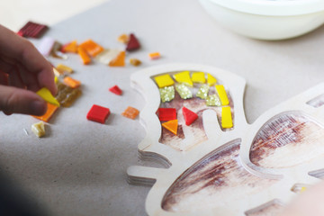 The process of creating a mosaic bat.