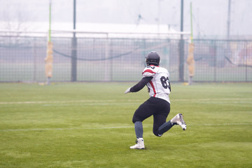 American football player running on the field