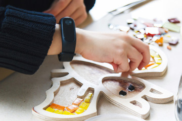 The process of creating a mosaic bat.