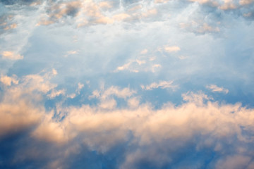 Blue sky, pink clouds, sunset.