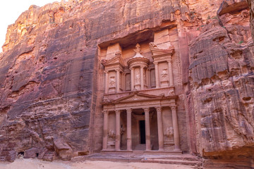 Al Khazneh. It is the treasury in Petra ancient city. Petra is the main attraction of Jordan. Petra is included in the UNESCO heritage list.
