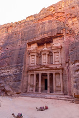 Al Khazneh. It is the treasury in Petra ancient city. Petra is the main attraction of Jordan. Petra is included in the UNESCO heritage list.